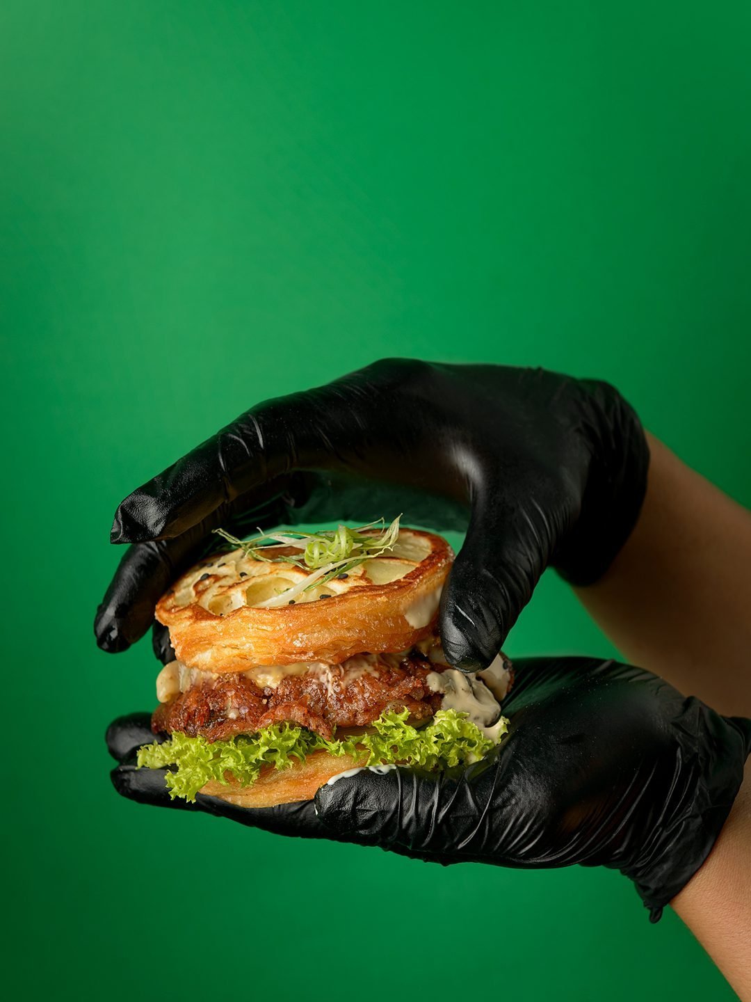 Preparing a KOYA smash burger